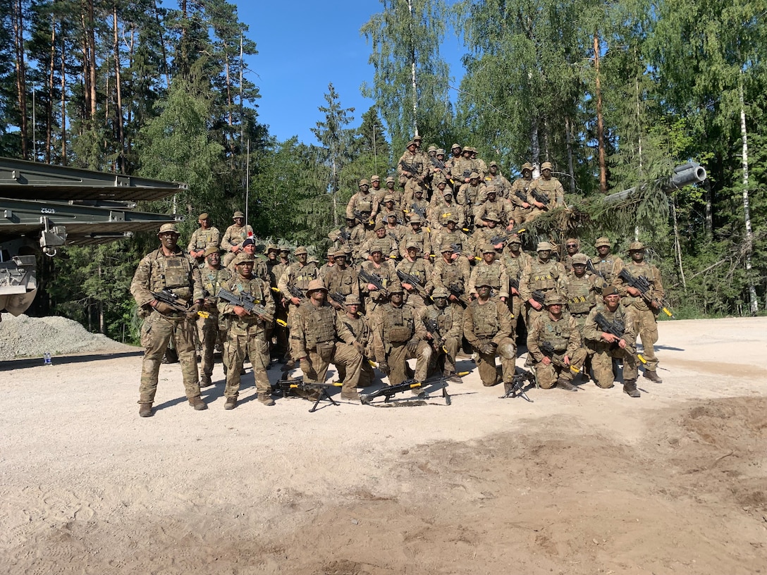 U.S. Army National Guard infantry and the United Kingdom's 7th Rifle Regiment pose for a photo during Operation Baltic Fist in Tapa, Estonia between June 27 and July 17, 2023. Operation Baltic Fist is part of the Department of Defense's Military Reserves Exchange Program in which U.S. reserve forces train with joint NATO partners to share tactics and procedures in different joint environments. (U.S. Army National Guard photo courtesy of Staff Sgt. Peter Fleming)