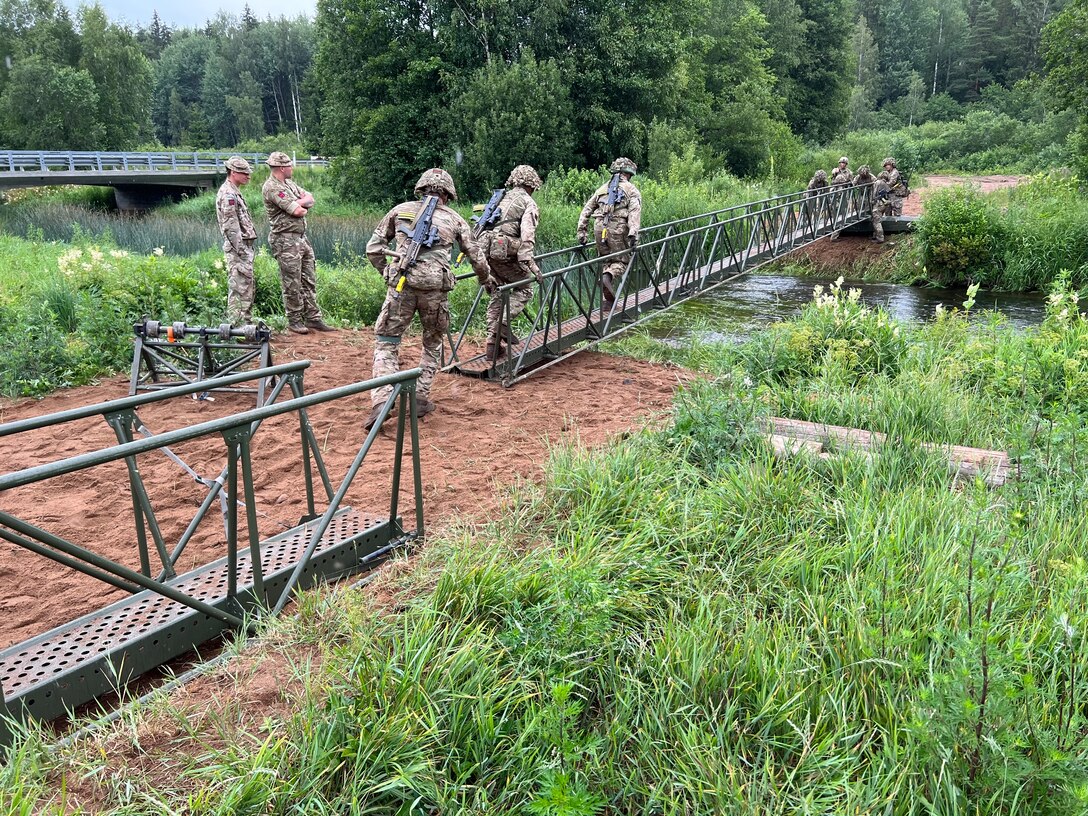 U.S. Army National Guard and the United Kingdom's 7th Rifle Regiment conduct water crossing training as part of Operation Baltic Fist in Tapa, Estonia between June 27 and July 17, 2023. Operation Baltic Fist is part of the Department of Defense's Military Reserves Exchange Program in which U.S. reserve forces train with joint NATO partners to share tactics and procedures in different joint environments. (U.S. Army National Guard photo courtesy of Staff Sgt. Peter Fleming)