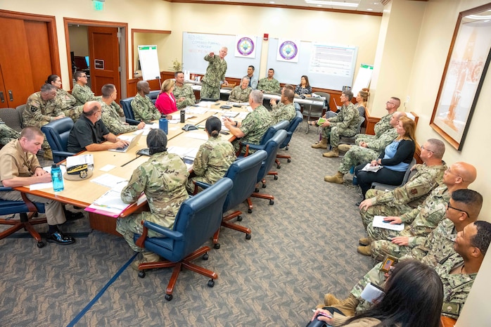 Joint Task Force-Red Hill (JTF-RH) Commander, U.S. Navy Vice Adm. John Wade, delivers remarks during a planning meeting between JTF-RH staff and members of the Navy Closure Task Force-Red Hill (NCTF-RH) at Joint Base Pearl Harbor-Hickam, Hawaii, Nov. 28, 2023.