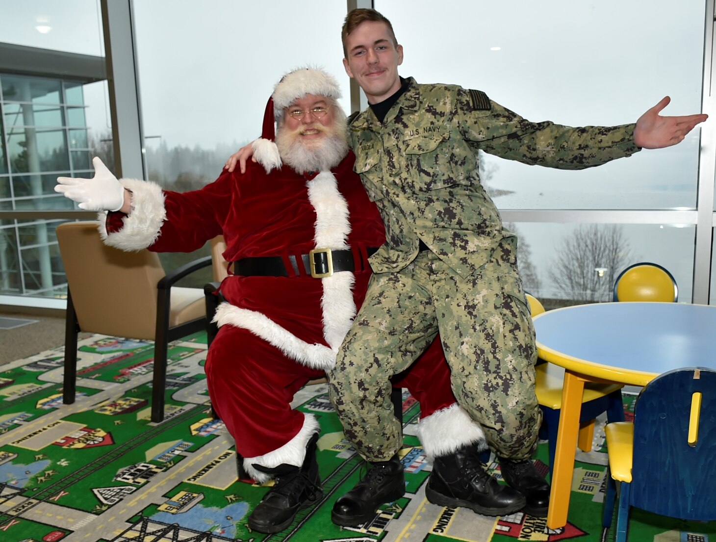 Seasonal Santa festivities at Naval Hospital Bremerton….NHB’s annual tree lighting ceremony to commemorate the trilogy of light, faith and hope that embodies the observance was enhanced by a special visit from Father Christmas who took the time to share well wishes and warm greetings with staff, patient and visitor alike…(Official Navy photo by Douglas H Stutz, NHB/NMRTC Bremerton public affairs officer).