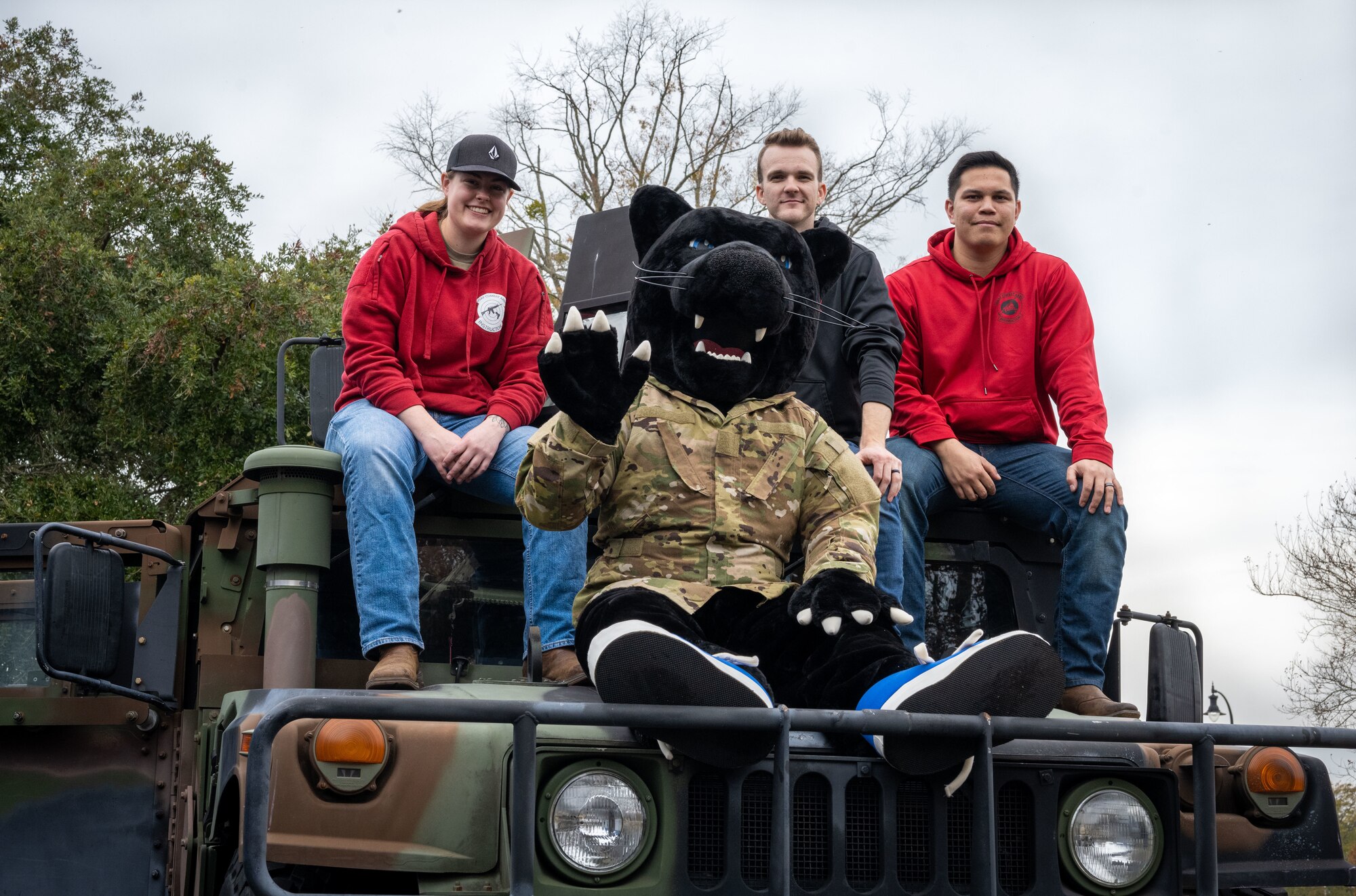 Members assigned to the 4th Security Forces Squadron pose for a photo before the holiday parade in downtown Goldsboro, North Carolina, Dec. 2, 2023. Seymour Johnson personnel focus on building trust and relationships between service members and the community, therefore bridging the gap between military and civilians. (U.S. Air Force photo by Senior Airman Sabrina Fuller-Judd)
