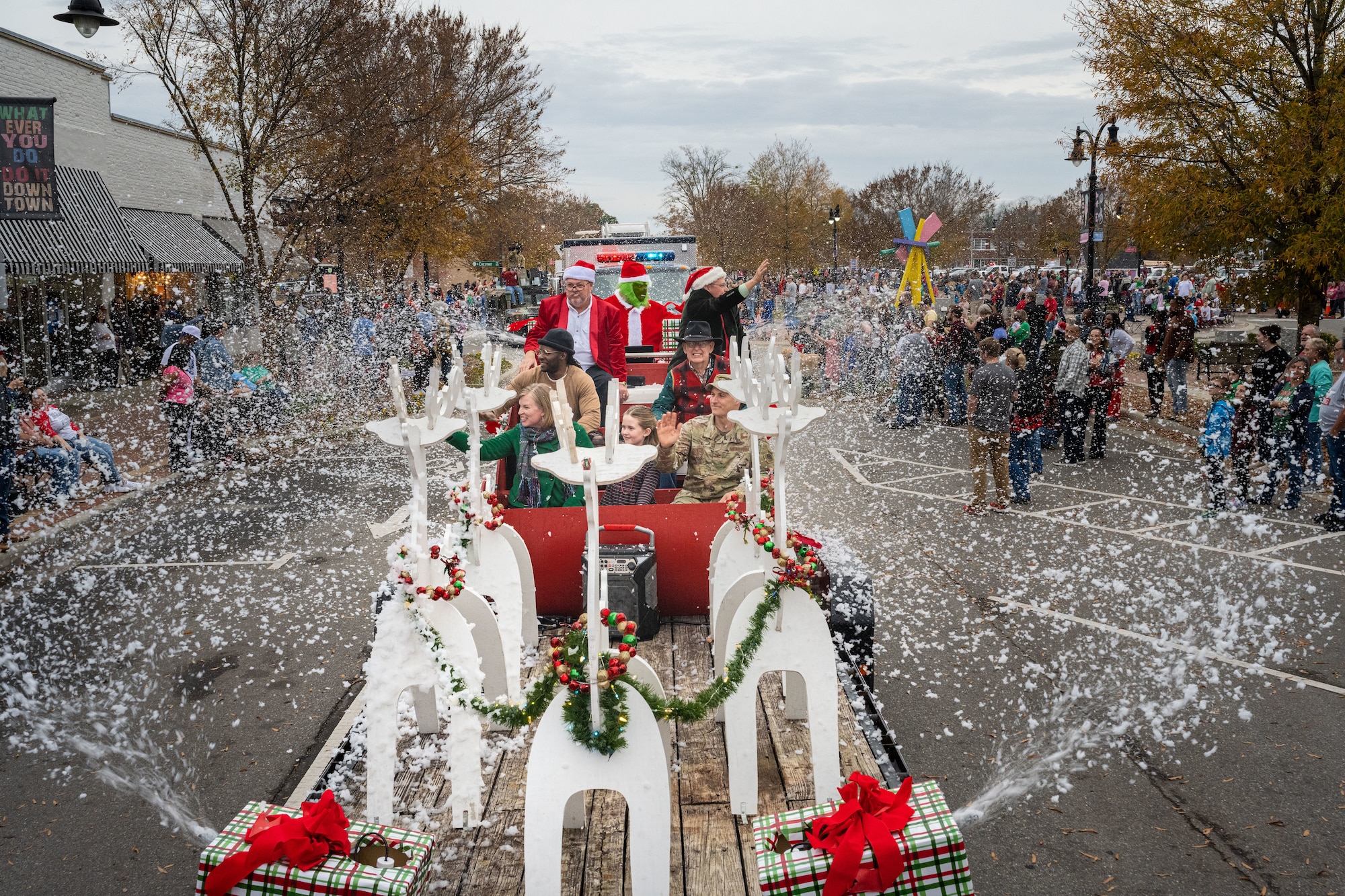 Members of 4th Fighter Wing celebrate the holidays with the community through a holiday parade in downtown Goldsboro, North Carolina, Dec. 2, 2023. The holiday parade is an annual event that commemorates the season and the upcoming new year. (U.S. Air Force photo by Senior Airman Sabrina Fuller-Judd)