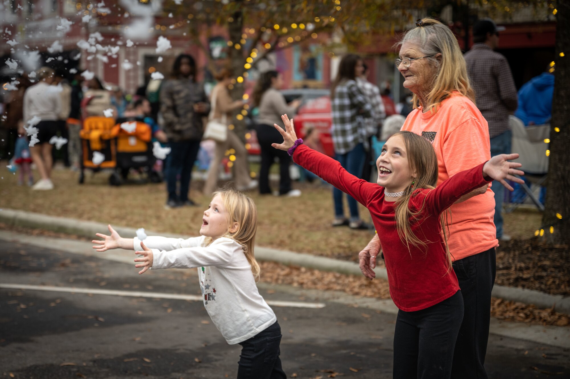 Members of the community attend a holiday parade in downtown Goldsboro, North Carolina, Dec. 2, 2023. The 4th FW Airmen celebrate the holidays with the community building trust and fostering support. (U.S. Air Force photo by Senior Airman Sabrina Fuller-Judd)