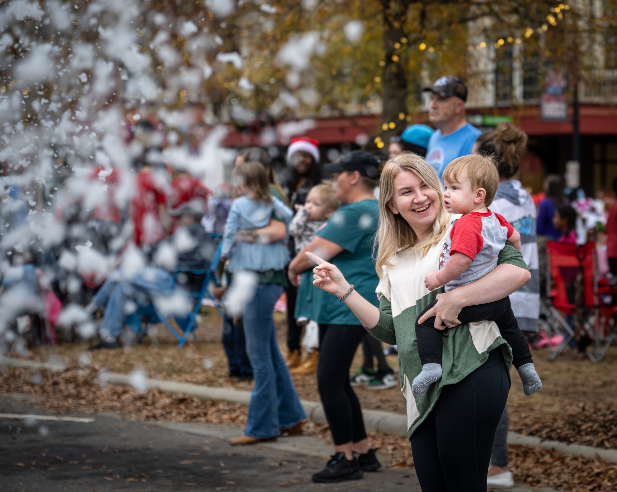 Members of the community attend a holiday parade in downtown Goldsboro, North Carolina, Dec. 2, 2023. The 4th FW Airmen celebrate the holidays with the community building trust and fostering support. (U.S. Air Force photo by Senior Airman Sabrina Fuller-Judd)