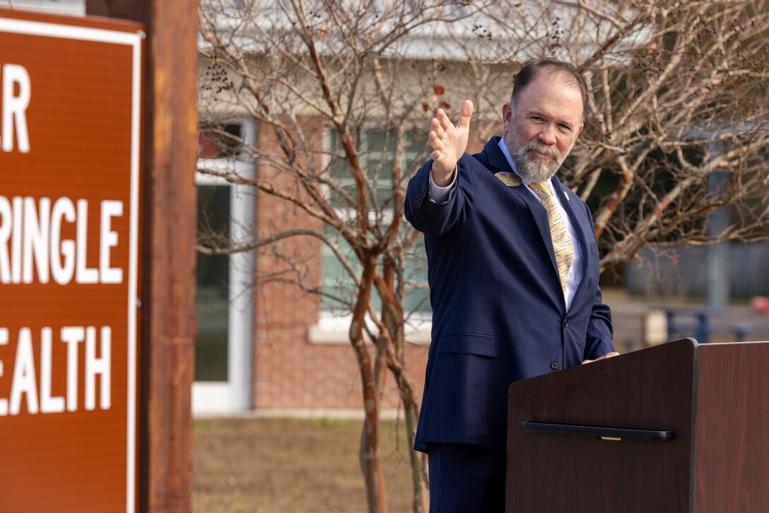 Barry Fitzpatrick Jr., director, Marine and Family Programs Division, MCCS Lejeune-New River, gives remarks at the Commander Charles K. Springle Behavioral Health Complex building rededication ceremony at Midway Park on Marine Corps Base Camp Lejeune, North Carolina, Dec. 4, 2023. Springle was killed in Iraq in 2009 after serving 21 years in the U.S. Navy as a licensed clinical social worker. In his memory, the building honors his dedication to helping fellow service members. (U.S. Marine Corps photo by Lance Cpl. Alyssa J. Deputee)