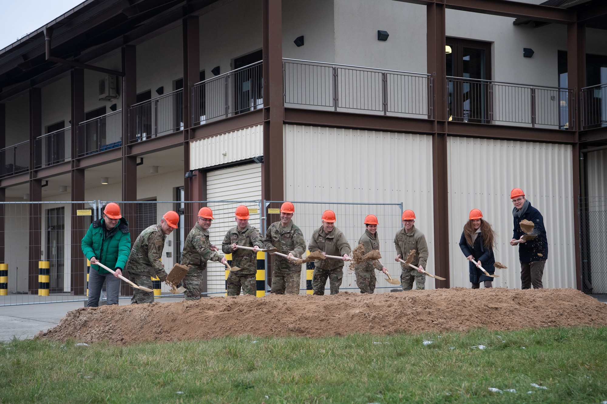 Leaders from across the 521st Air Mobility Operations Wing and contractors break ground on the 726th Air Mobility Squadron passenger terminal expansion project in a ceremony at Spangdahlem Air Base, Germany, Dec. 1, 2023. The $11 million, 2-year expansion will improve the ability to the 726th AMS to support the execution of rapid global mobility operations. (Courtesy photo)