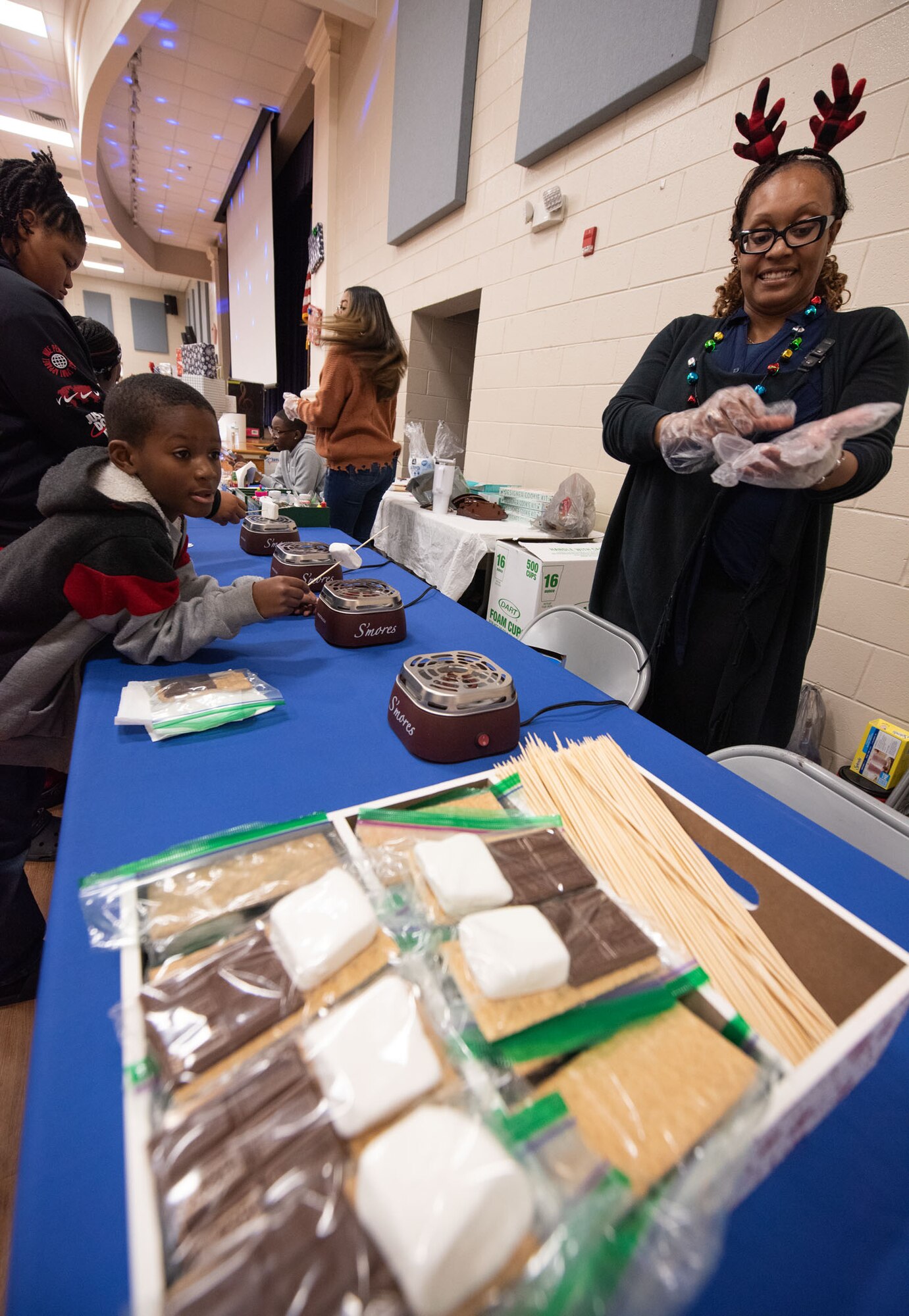 NIWC Atlantic hosts Holiday STEM Shop 2023 at Berkeley Middle School in Moncks Corner, SC on December 2, 2023.  Students use STEM to make Holiday gifts for their family.
