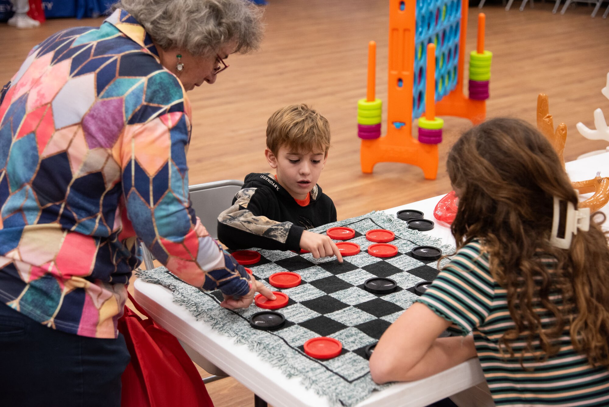 NIWC Atlantic hosts Holiday STEM Shop 2023 at Berkeley Middle School in Moncks Corner, SC on December 2, 2023.  Students use STEM to make Holiday gifts for their family.