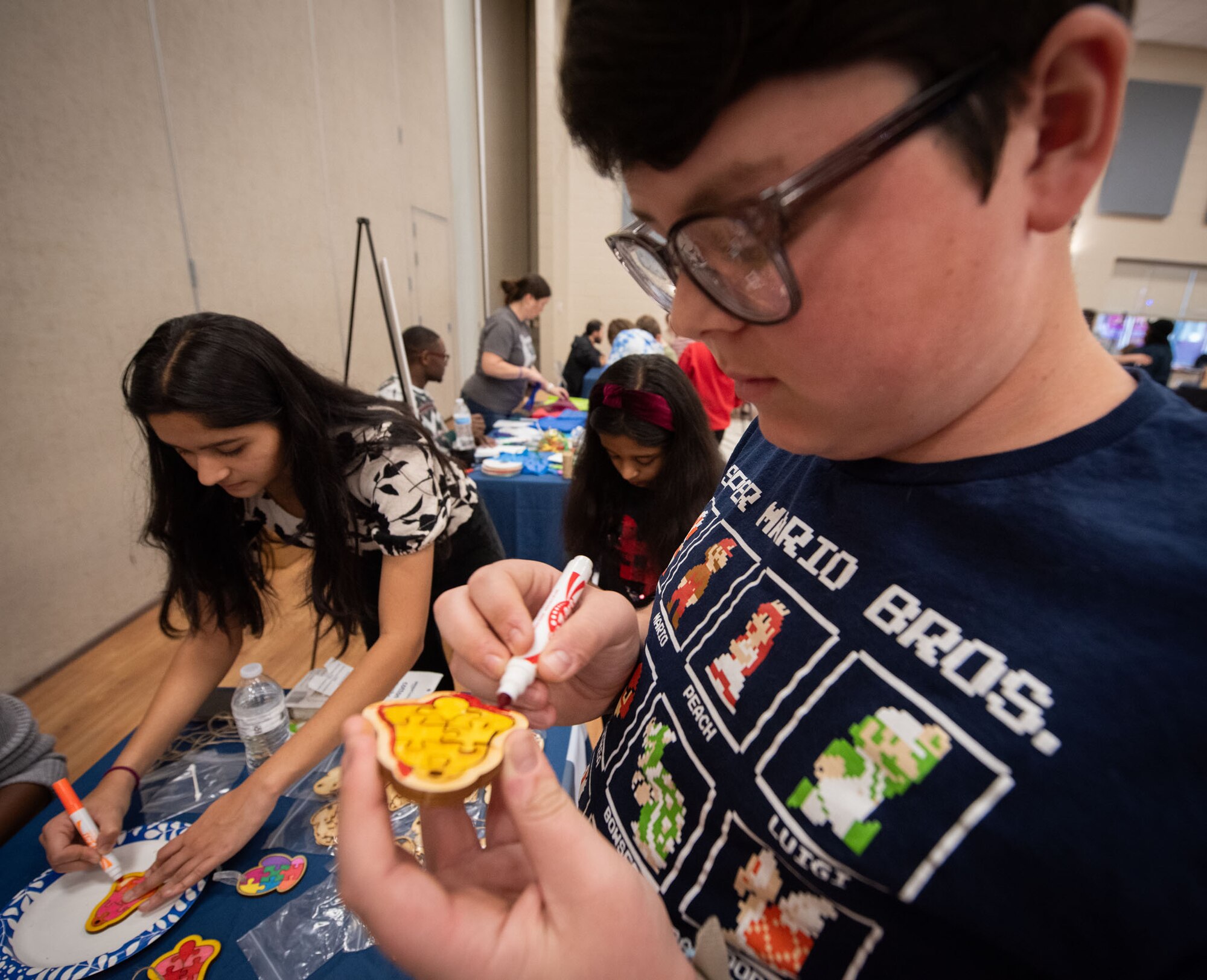 NIWC Atlantic hosts Holiday STEM Shop 2023 at Berkeley Middle School in Moncks Corner, SC on December 2, 2023.  Students use STEM to make Holiday gifts for their family.