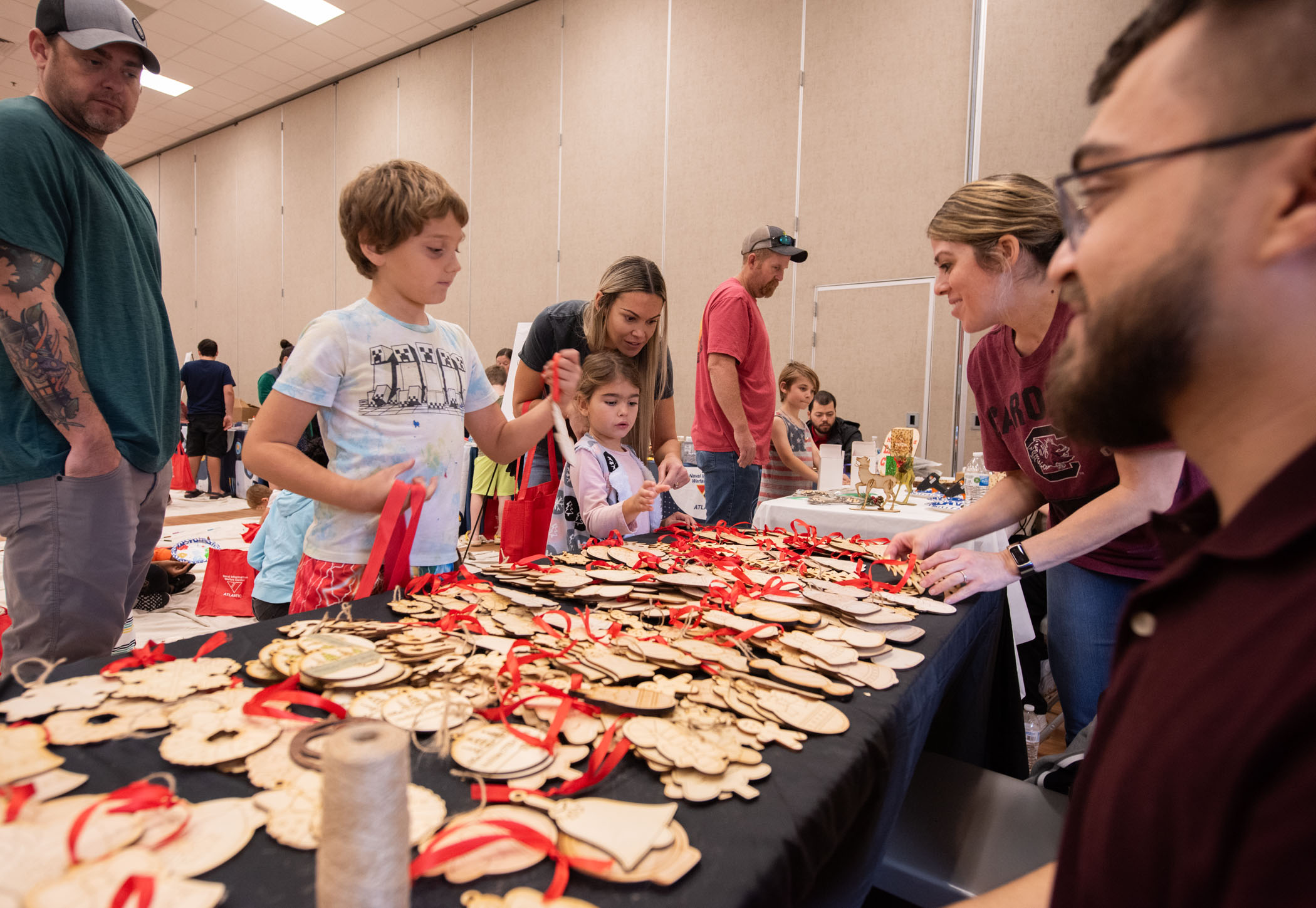 NIWC Atlantic hosts Holiday STEM Shop 2023 at Berkeley Middle School in Moncks Corner, SC on December 2, 2023.  Students use STEM to make Holiday gifts for their family.