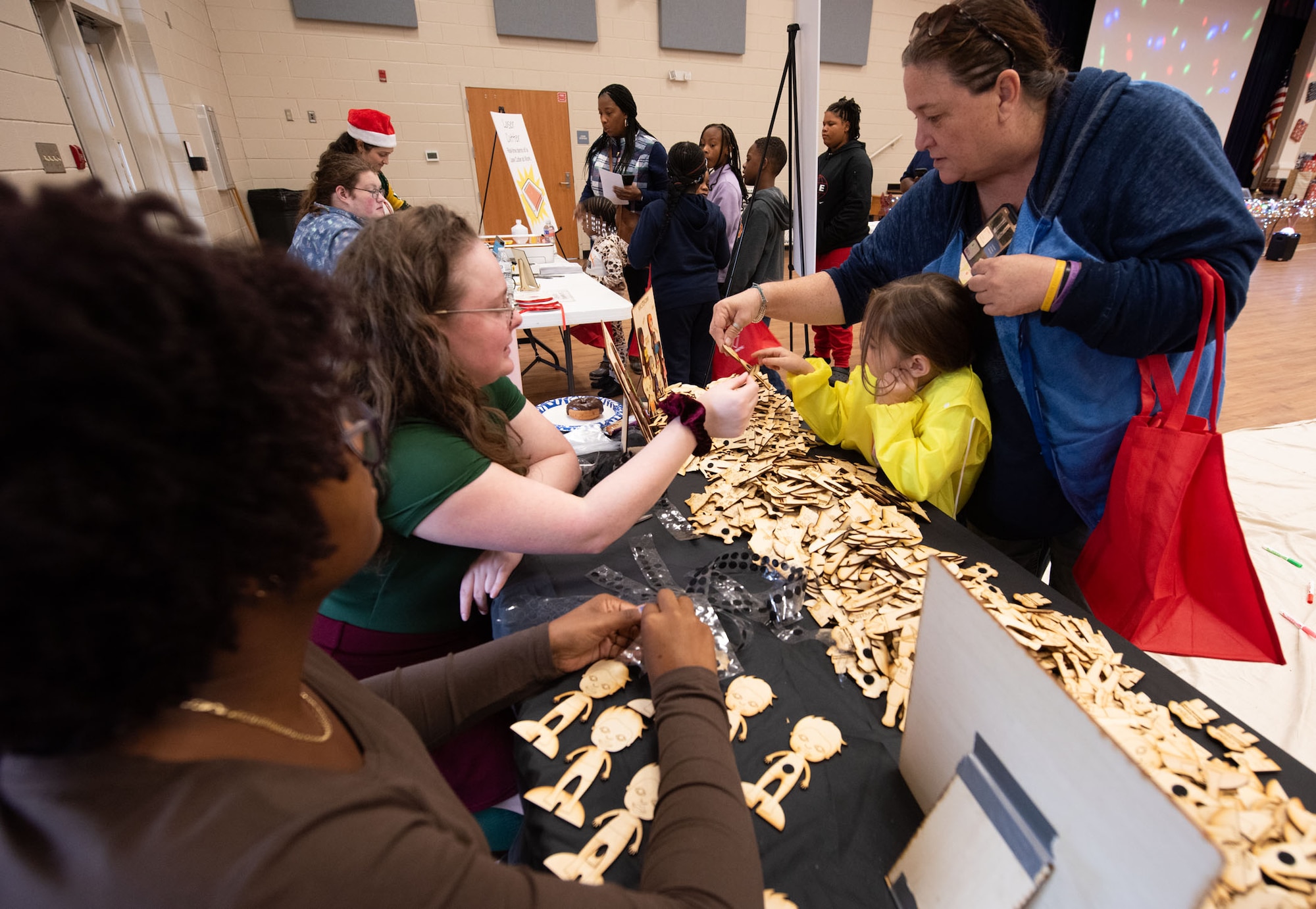 NIWC Atlantic hosts Holiday STEM Shop 2023 at Berkeley Middle School in Moncks Corner, SC on December 2, 2023.  Students use STEM to make Holiday gifts for their family.