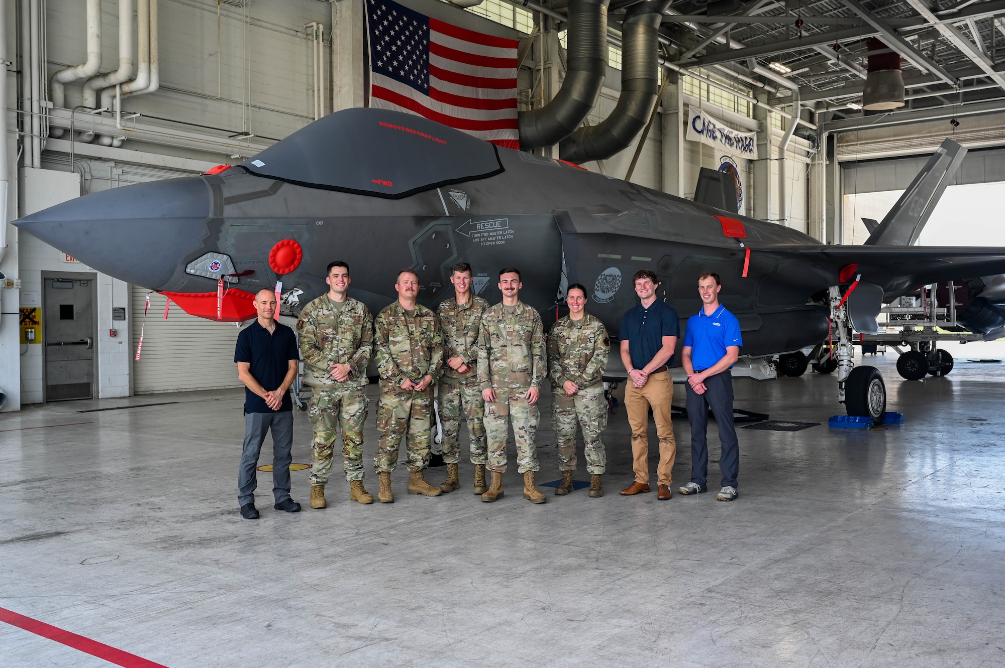 U.S. Air Force Tech. Sgt. Andrew McCamish, a 58th Aircraft Maintenance Unit aircraft section chief, and U.S. Air Force Staff Sgt. Tyler Schmitt, a 33rd Maintenance Group quality assurance inspector, developed reusable wash covers and a new canopy cover for the F-35A Lightning II at Eglin Air Force Base, Florida.