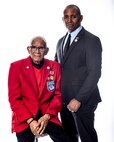 Sgt. Thomas Newton, a documented Tuskegee Airman, and his son, Steve Newton, pose for a portrait during a visit to Rickenbacker Air National Guard Base, Ohio, on Dec. 1, 2023. Newton, stationed at RANGB when it was named Lockbourne Air Force Base, returned after 74 years to be the guest of honor during a ceremony to celebrate the 75th anniversary of desegregation in the U.S. military.