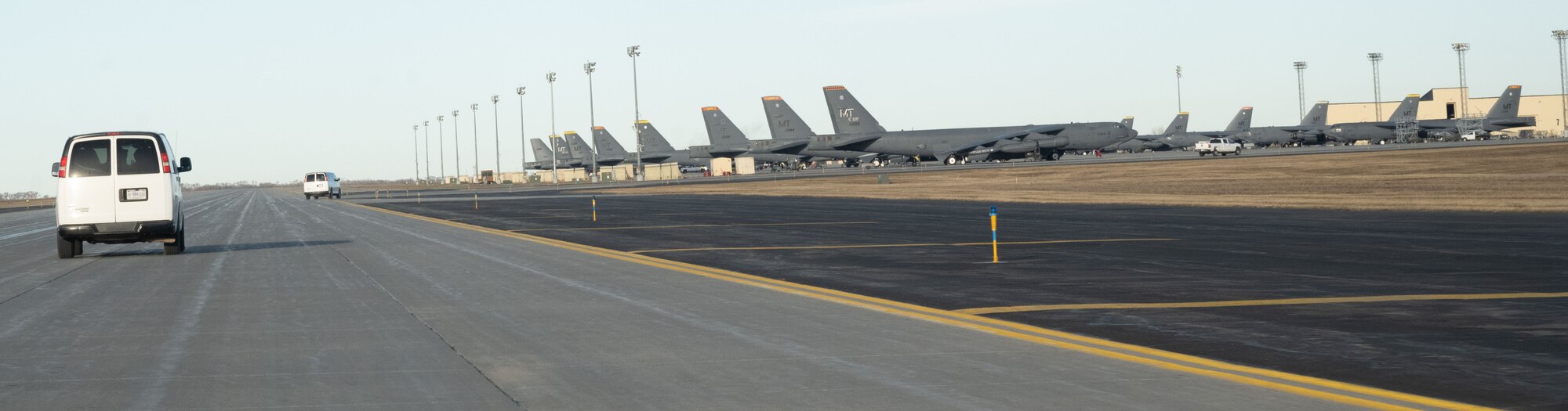 Team Minot Airmen race to B-52H Stratofortress while participating in an exercise at Minot Air Force Base, North Dakota, Dec. 6, 2023. Airmen from the 5th Bomb Wing participated in a training exercise testing their mission readiness.
