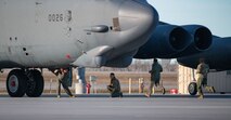 Team Minot Airmen rush to get a B-52H Stratofortress off the ground as part of a readiness event at Minot Air Force Base, North Dakota, Dec. 6, 2023. The exercise was a collaboration between Minot AFB units to improve overall readiness.