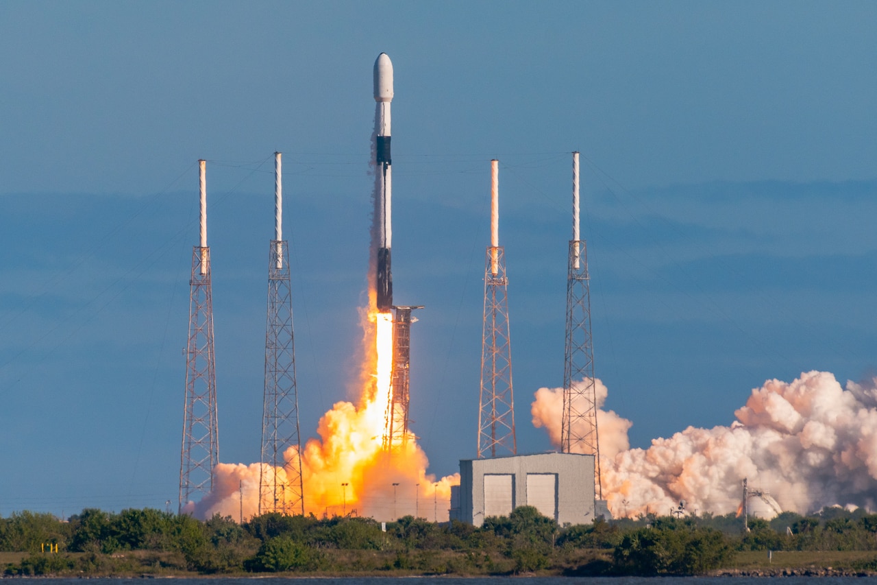 A rocket launches into space.