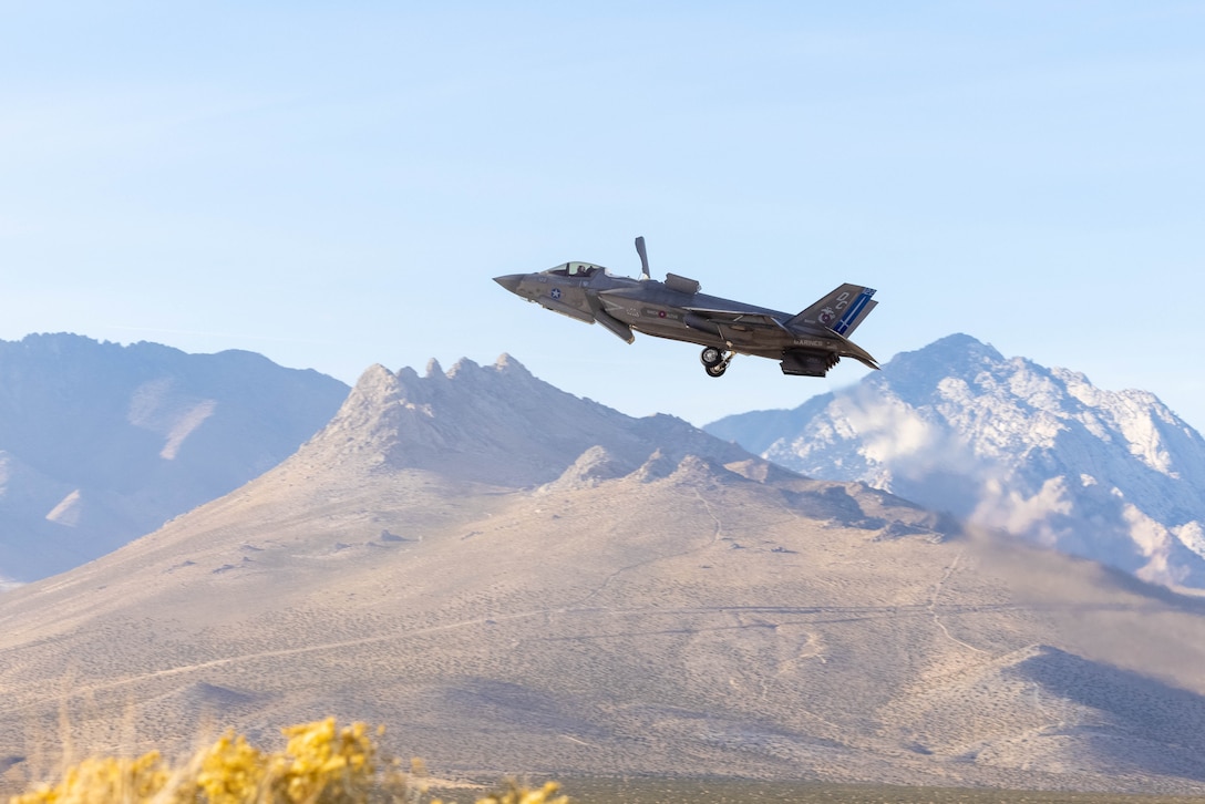 A U.S. Marine Corps F-35B Lightning II aircraft with Marine Fighter Attack Squadron (VMFA) 211, Marine Aircraft Group 13, 3rd Marine Aircraft Wing, departs a forward arming and refueling point in support of Exercise Steel Knight 23.2 at Inyokern Airfield, California, Dec. 2, 2023. A FARP is designed to provide refueling and rearming to rotary or fixed-wing assets enhancing reach and capacity of air operations in forward environments. Steel Knight 23.2 is a three-phase exercise designed to train I Marine Expeditionary Force in the planning, deployment and command and control of a joint force against a peer or near-peer adversary combat force and enhance existing live-fire and maneuver capabilities of the Marine Air-Ground Task Force. (U.S. Marine Corps photo by Lance Cpl. Jennifer Sanchez)