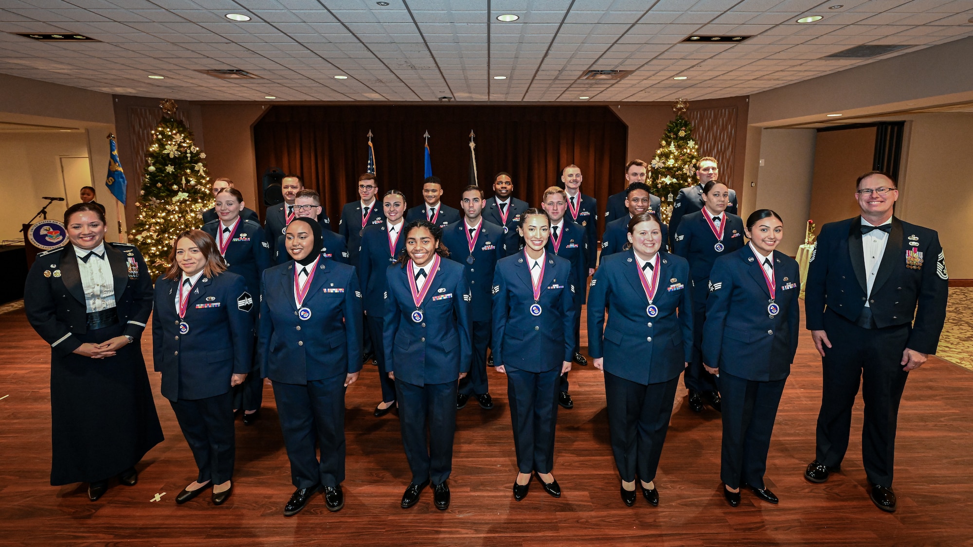ALS graduates pose for a group photo after completing their class.