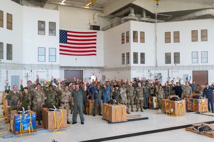 Group photo of Operation Christmas Drop 2023 volunteers.