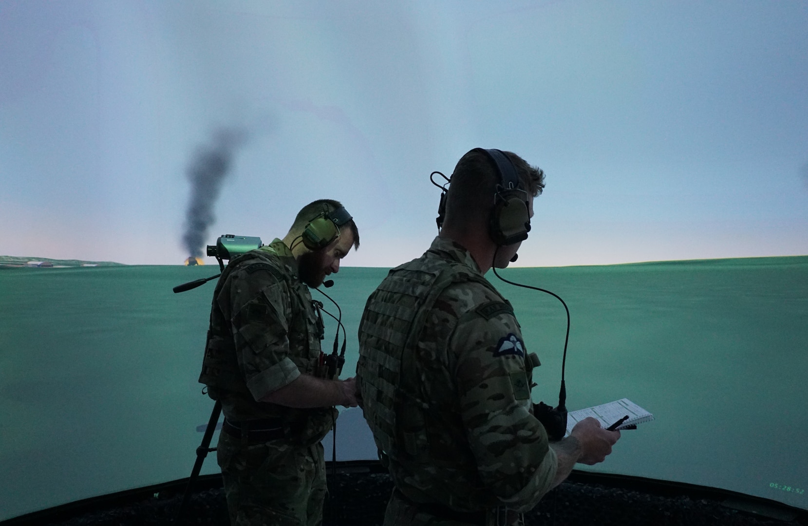 uniformed Royal Air Force member works in a virtual simulated environment