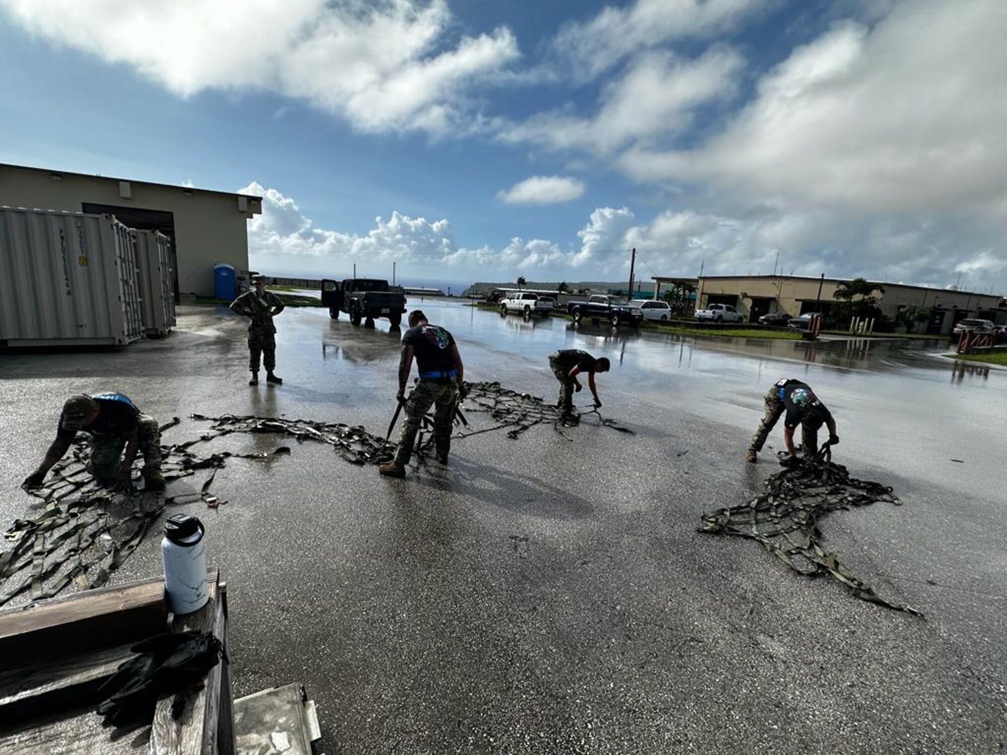 Airmen from the 734th Air Mobility Squadron inspect nets for a deficiency during a rodeo at Andersen Air Force Base, Guam, Nov. 14, 2023. This event was held to showcase the Multi-Capable Airmen concept and develop esprit de corps through friendly competition. (Courtesy photo)
