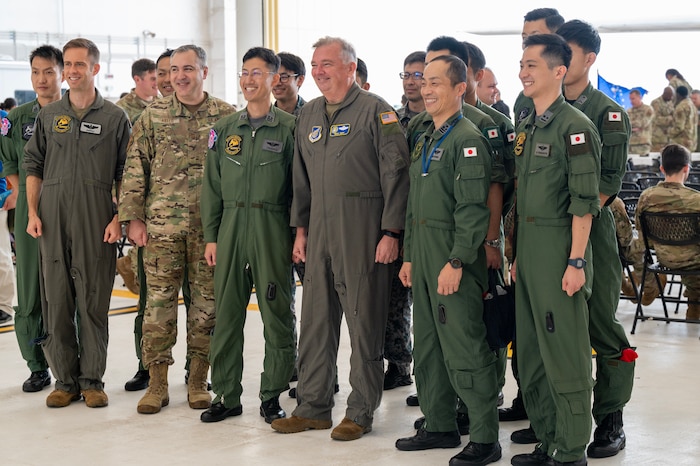 Photo of a U.S. Air Force leader standing along side Ally and partner leaders for a group photo
