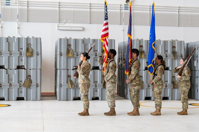 Photo of USAF honor guardsmen posting colors during a ceremony