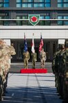Service members from the U.S. Army, Japan Ground Self-Defense Force, and the Australian Army, renders a salute to the national anthems of each country at the opening ceremony for Yama Sakkura 85 in Camp Asaka, Saitama, Japan, Dec. 4, 2023.