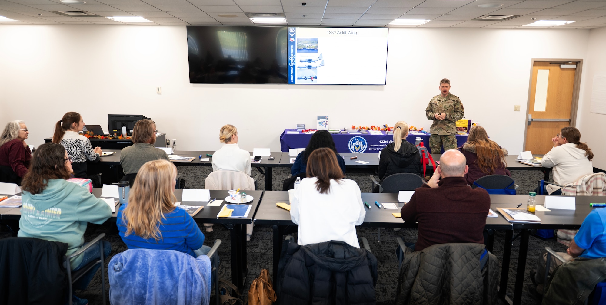 U.S. Air Force Master Sgt. Devin Duryee, 133rd Maintenance Squadron, talks about the C-130 H3 Hercules in St. Paul, Minn., Nov. 17, 2023.