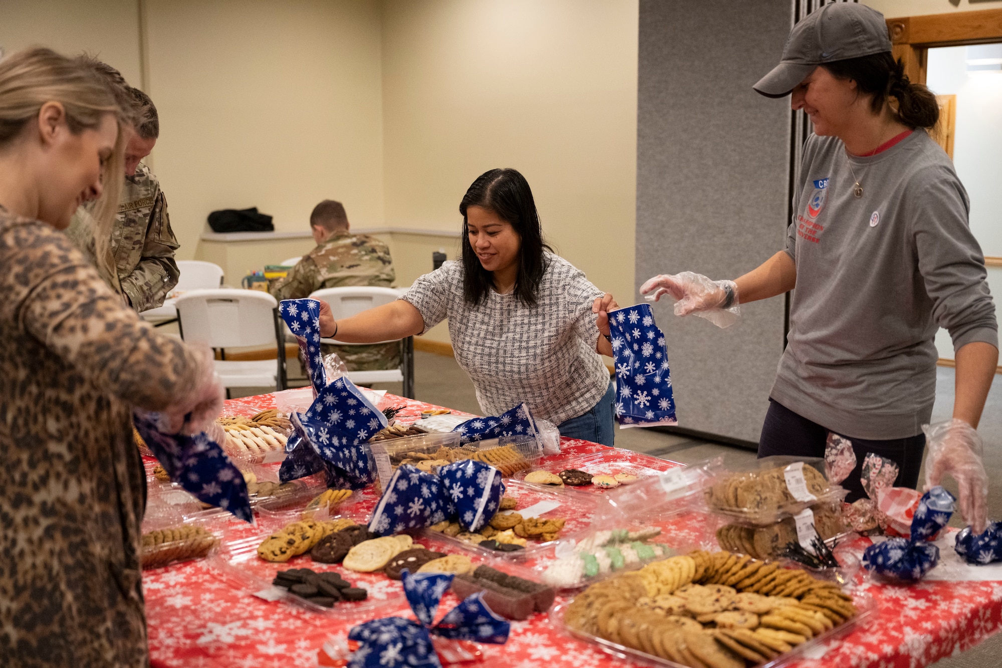 Annual Raider Holiday Cheer event provides gift bags to Airmen