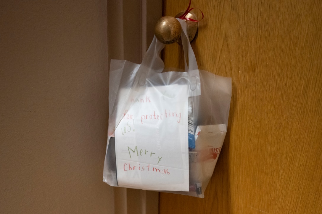 Annual Raider Holiday Cheer event provides gift bags to Airmen