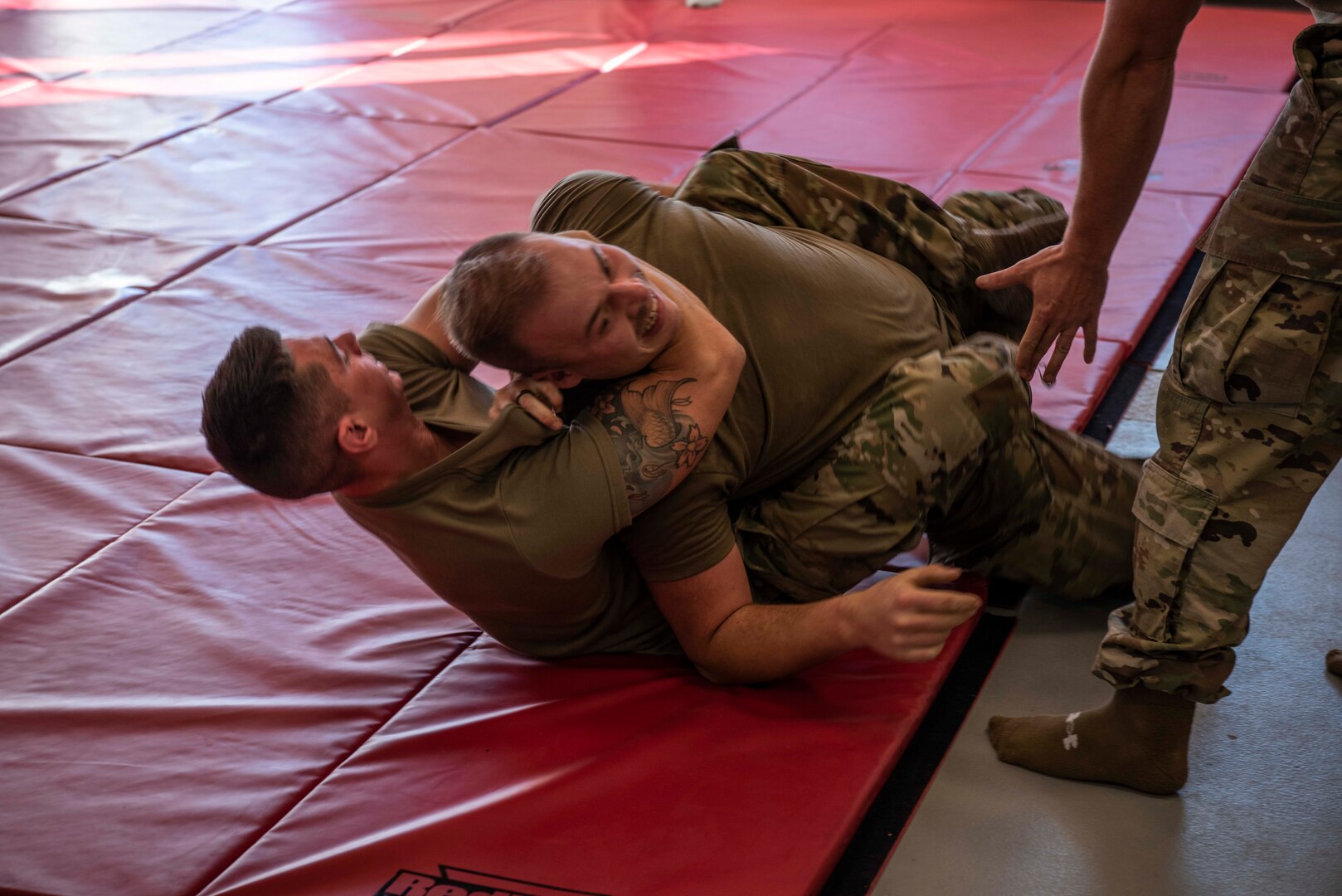 Members of the 128th Air Refueling Wing Security Forces Squadron practice combatives as part of augmentee training Nov. 9 at the Wisconsin Air National Guard base in Milwaukee. The augmentee training program, an essential component of the squadron's operations, prepares selected members to step into specialized roles during periods of heightened security or crisis. 128th Air Refueling Wing photo by Master Sgt. Kellen Kroening