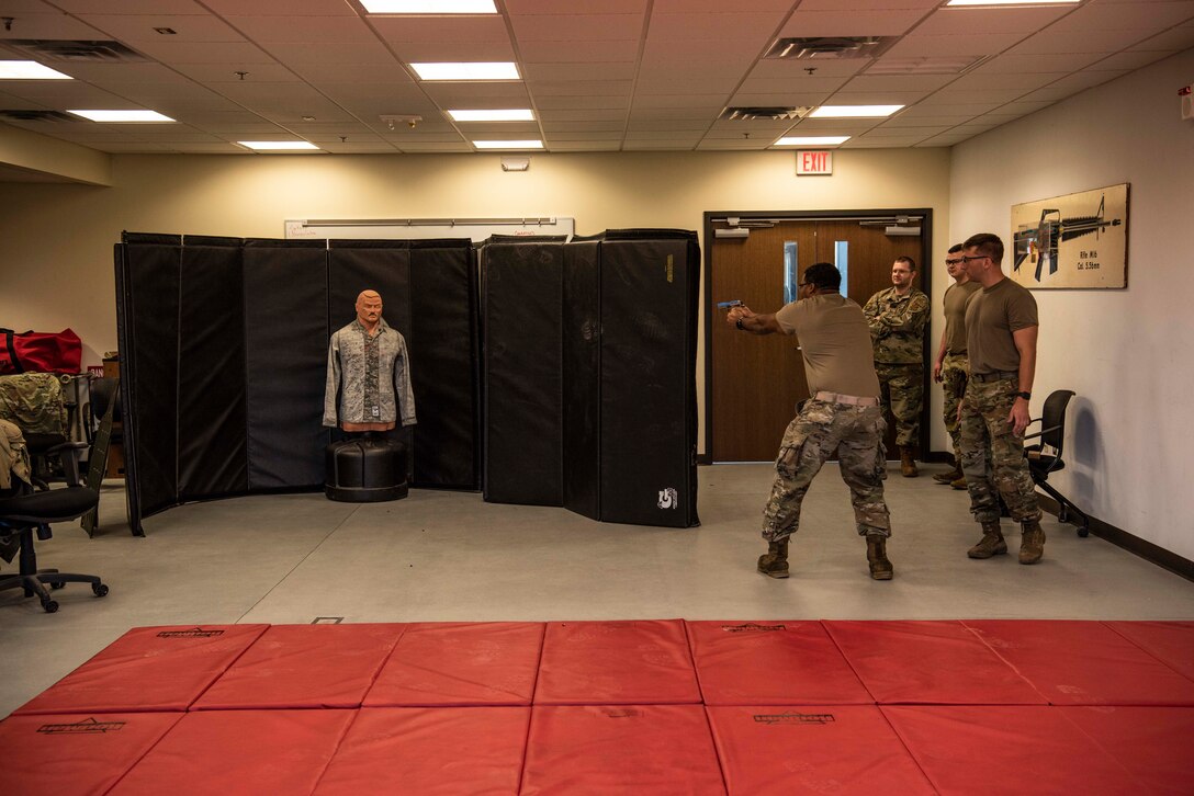 Members of the 128th Air Refueling Wing Security Forces Squadron take part in shoot-house familiarization as part of augmentee training Nov. 9 at the Wisconsin Air National Guard base in Milwaukee. The augmentee training program, an essential component of the squadron's operations, prepares selected members to step into specialized roles during periods of heightened security or crisis. 128th Air Refueling Wing photo by Master Sgt. Kellen Kroening