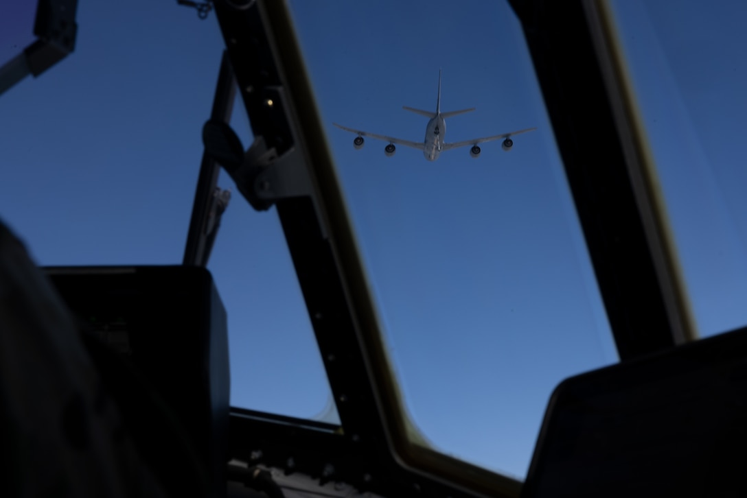 A U.S. Air Force KC-135 Stovetanker with 912 Air Refueling Squadron, 92nd Operations Group, 452nd Air Mobility Wing, prepares to attach and provide fuel to an HC-130J Combat King II aircraft with 39th RQS, 920th RQW,  during joint combat search and rescue training in support of Exercise Steel Knight 23.2, in conjunction with Exercise Distant Fury Stallion 23.2, off the coast of San Diego, Dec. 7, 2023. Steel Knight 23.2 is a three-phase exercise designed to train I Marine Expeditionary Force in the planning, deployment and command and control of a joint force against a peer or near-peer adversary combat force and enhance existing live-fire and maneuver capabilities of the Marine Air-Ground Task Force. (U.S. Marine Corps photo by Lance Cpl. Samantha Devine)