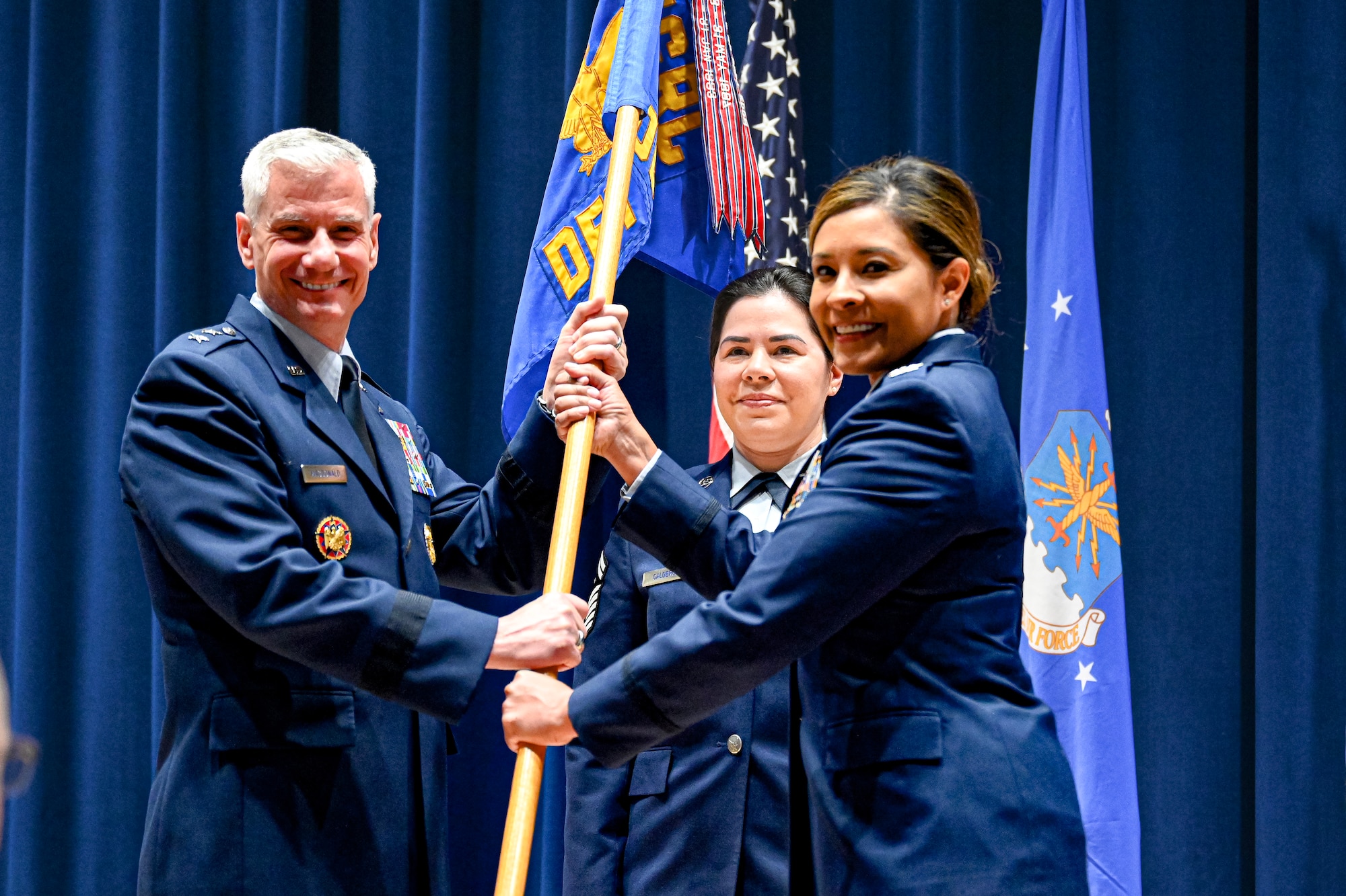 U.S. Air Force Col. Angela Tapia accepts command of the I.G. Brown Training and Education Center from Maj. Gen. Keith G. MacDonald, on Dec. 7, 2023, during a change of command ceremony at McGhee Tyson Air National Guard Base, Tennessee. Tapia is the 19th commander of the TEC, the Air National Guard’s Total Force enlisted professional military education and continuing education center.