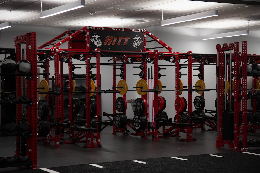 A High Intensity Tactical Training sign sits above weight racks in the future Warrior Athlete Readiness and Resilience Center, currently under construction, on Marine Corps Base Camp Lejeune, North Carolina, Nov. 15, 2023. This facility will be a collaborative, holistic program that will enhance combat readiness in conjunction with warfighter resiliency by strengthening physical, mental, social, and spiritual domains necessary to overcome any situation.