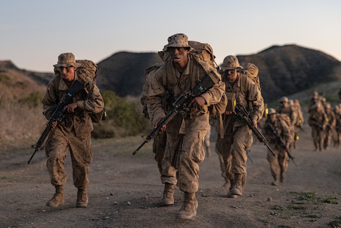 U.S. Marine Corps recruits with Lima Company, 3rd Recruit Training Battalion, hike the Reaper at Marine Corps Base Camp Pendleton, California, Dec. 6, 2023. The Reaper hike is the last event recruits must complete before they earn the title of United States Marine. (U.S. Marine Corps photo by Lance Cpl. Jacob B. Hutchinson)