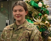 Airman Jasmine Neill, 705th Munitions Squadron nuclear weapons technician, poses for a portrait at Minot Air Force Base, North Dakota, Dec. 8, 2023. Neill was the recipient of a free airline ticket through Operation Home for the Holidays. (U.S. Air Force photo by Airman 1st Class Kyle Wilson)