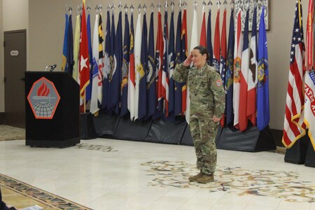 Sgt. Maj. Lisa M. Gandy takes charge of the CCoE's Non Commissioned Officer's Academy during a change of responsibility Dec. 4, 2023.