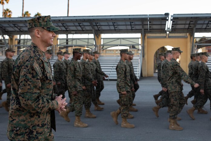 Sgt. Maj. Carlos Ruiz, the 20th Sergeant Major of the Marine Corps, calls cadence for Marines with Fox Company, 2nd Recruit Training Battalion, at Marine Corps Recruit Depot San Diego, Dec.5, 2023. Ruiz visited the Depot to listen to the ideas, questions, and concerns of Marines throughout the installation on how to improve the Marine Corps and recruiting mission. (U.S. Marine Corps photo by Lance Cpl. Sarah M. Grawcock)
