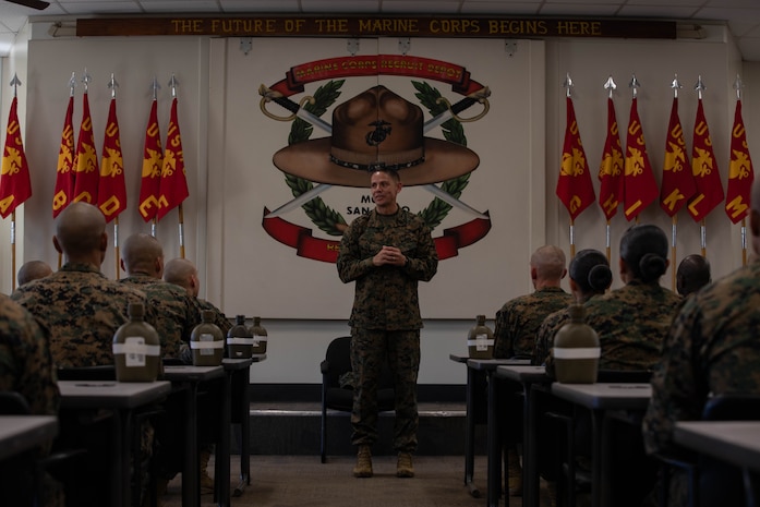 Sgt. Maj. Carlos Ruiz, the 20th Sergeant Major of the Marine Corps, talks to the students of drill instructor school at Marine Corps Recruit Depot San Diego, Dec.5, 2023. Ruiz visited the Depot to listen to the ideas, questions, and concerns of Marines throughout the installation on how to improve the Marine Corps and recruiting mission. (U.S. Marine Corps photo by Lance Cpl. Sarah M. Grawcock)