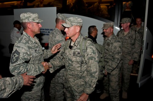 U.S. Air Force Airmen with the 820th Base Defense Group receive warm welcomes from unit members June 26, 2011, at Moody Air Force Base, Ga. Approximately 30 members of the 820th BDG returned home from a six-month deployment to Shindand Air Base, Afghanistan. (U.S. Air Force photo by Staff Sgt. Jamal D. Sutter)