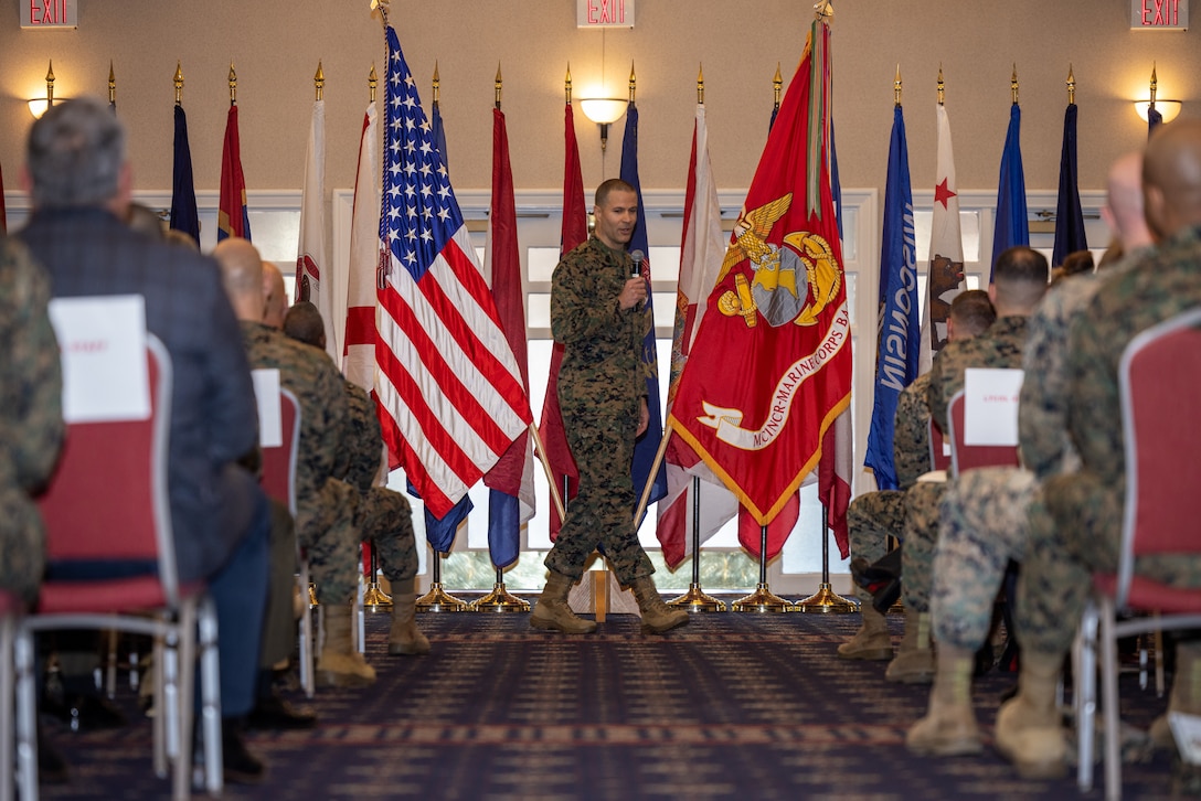 U.S. Marine Corps Sgt. Maj. Collin D. Barry, previous base sergeant major, Marine Corps Base Quantico, native of Tucumcari, New Mexico, gives a speech during his relief and appointment ceremony at The Clubs at Quantico, MCBQ, Virginia, Dec. 8, 2023. U.S. Marines, family and others gathered to witness Barry retire and transfer the duties onto Sgt. Maj. Michael R. Brown as the new sergeant major of MCBQ. (U.S. Marine Corps photo by Lance Cpl. Joaquin Dela Torre)