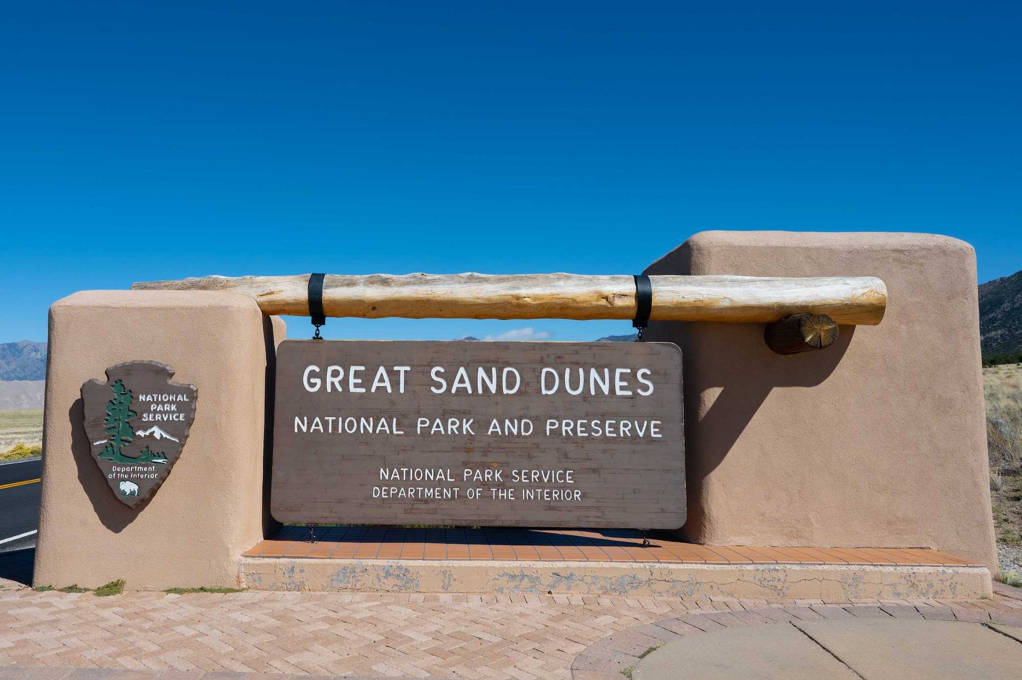 The welcome sign of Great Sand Dunes National Park and Preserve.