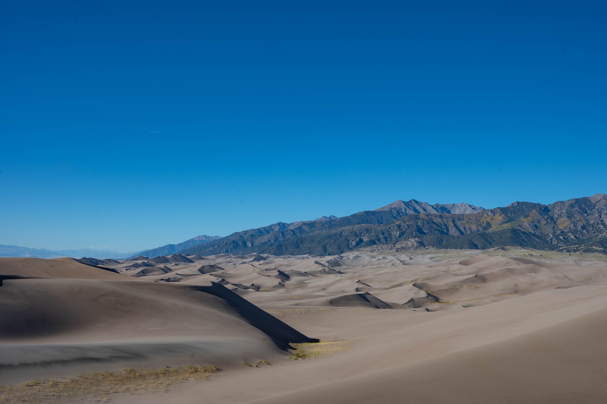 Sand dunes meet the Sangre De Cristo Mountain range of the Rocky Mountains.