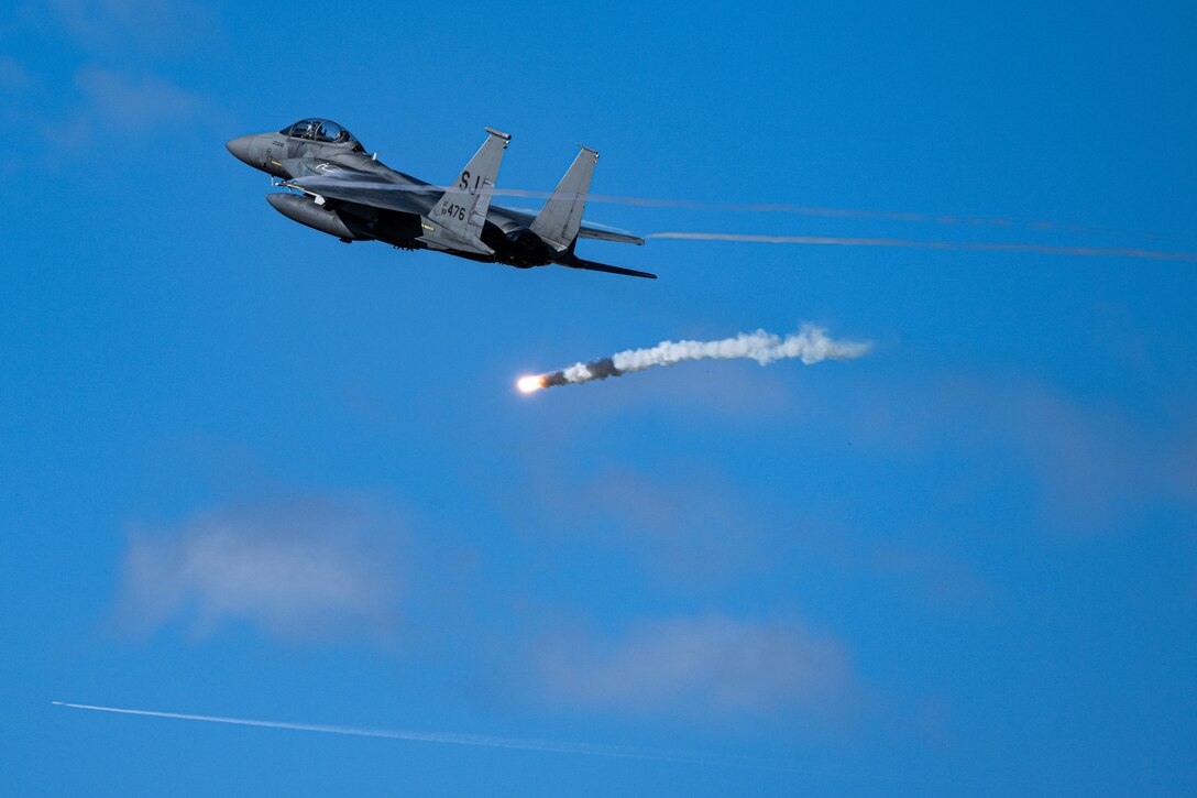 A U.S. Air Force F-15E Strike Eagle assigned to the 335th Fighter Squadron, Seymour Johnson Air Force Base, N.C., flies over Air Force Dare Bombing Range, N.C.