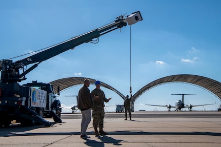 people demonstrate heavy equipment