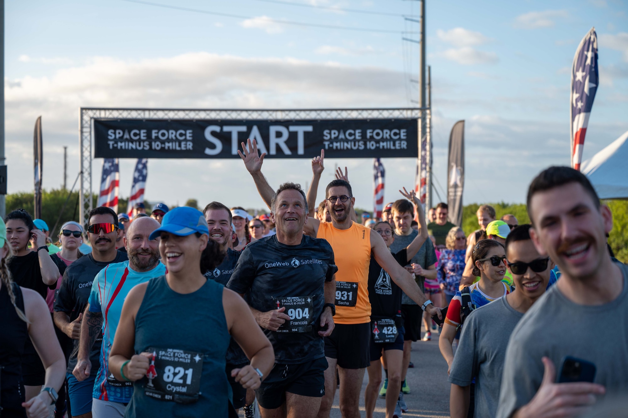 Participants cross the start line at the T-Minus 10-Miler at Cape Canaveral Space Force Station, Florida, Dec. 9, 2023. The T-Minus 10-Miler celebrates the Space Forces birthday. (U.S. Space Force photo by Senior Airman Samuel Becker)