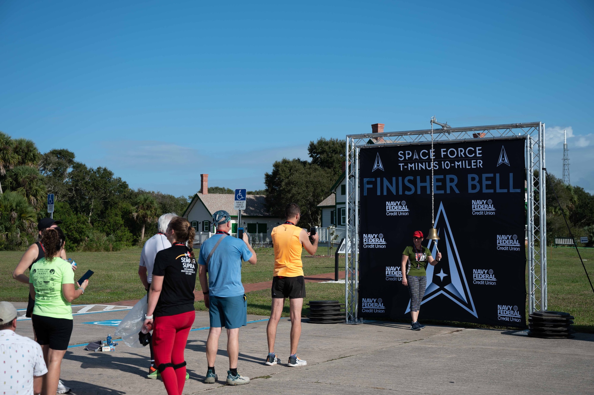 Participants at the T-Minus 10-Miler wait in line to pose for photo at Cape Canaveral Space Force Station, Florida, Dec. 9, 2023. The T-Minus 10-Miler celebrates the Space Forces birthday. (U.S. Space Force photo by Senior Airman Samuel Becker)