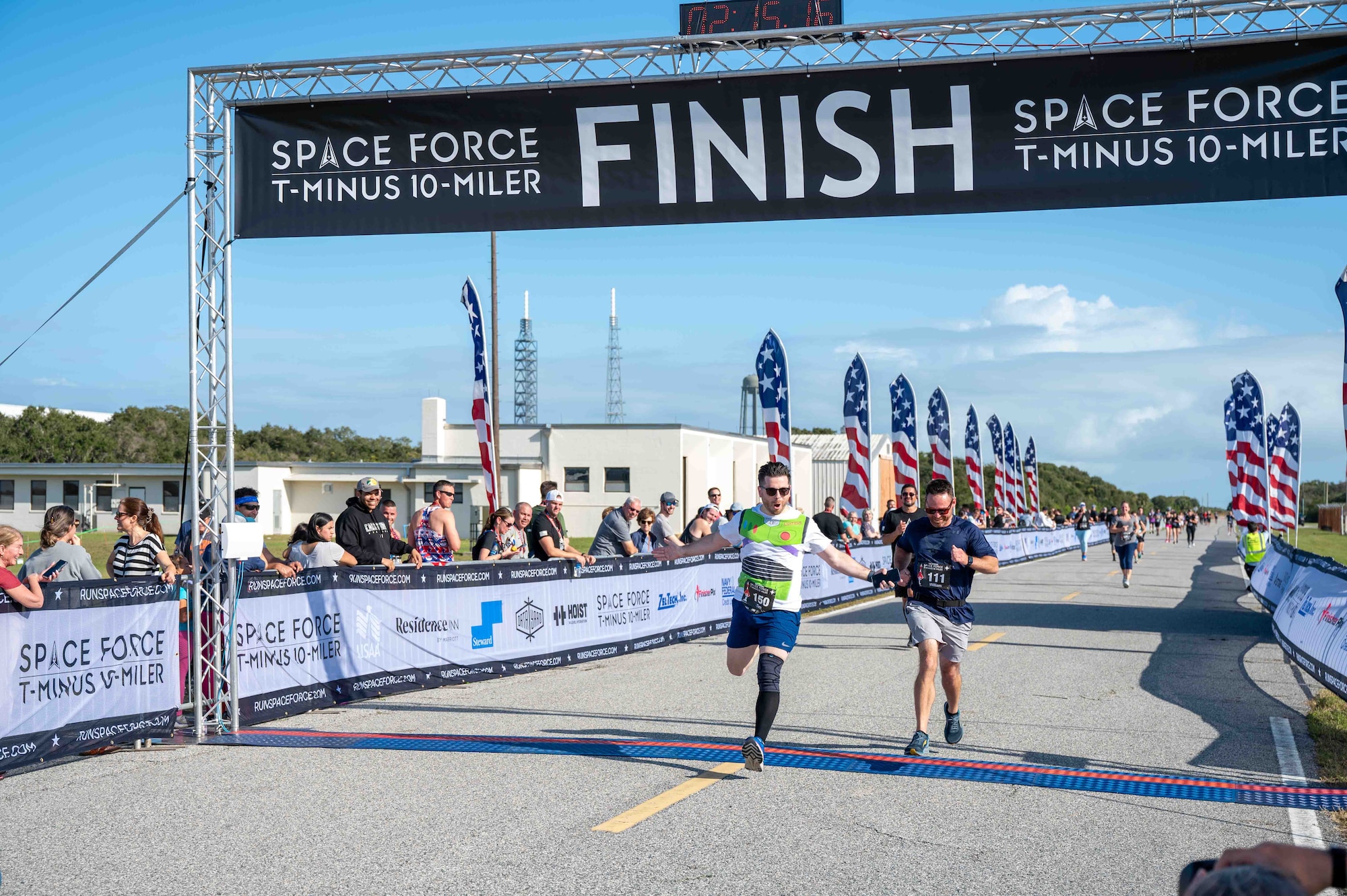 T-Minus 10-Miler participants cross the finish line at Cape Canaveral Space Force Station, Florida, Dec. 9, 2023. The T-Minus 10-Miler celebrates the Space Forces birthday. (U.S. Space Force photo by Senior Airman Samuel Becker)